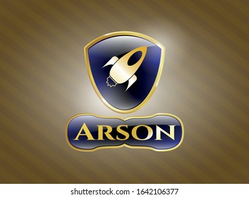  Gold badge with rocket icon and Arson text inside