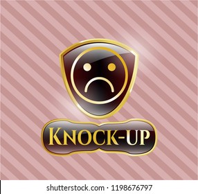  Gold badge with sad face icon and Knock-up text inside