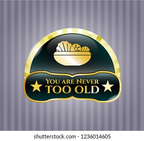  Gold badge with salad icon and You are Never too old text inside