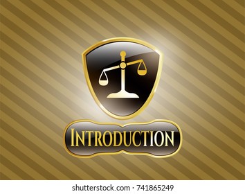  Gold badge with scale icon and Introduction text inside