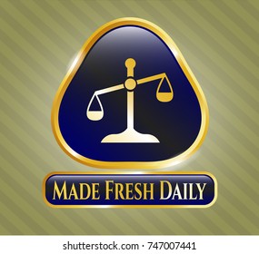  Gold badge with scale icon and Made Fresh Daily text inside