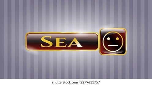 Gold badge with serious face icon and Sea text inside