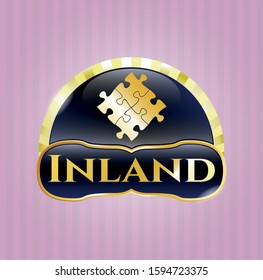  Gold badge with solution icon and Inland text inside
