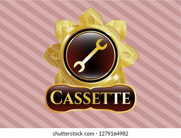  Gold badge with wrench icon and Cassette text inside