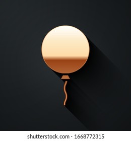 Gold Balloon with ribbon icon isolated on black background. Long shadow style. Vector Illustration