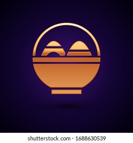Gold Basket with easter eggs icon isolated on black background. Happy Easter.  Vector Illustration
