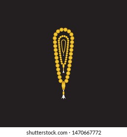 Gold beads on a black background. Net beads are realistic. A beautiful chain of yellow color. A decorative element from golden ball design vector icon illustration inspiration. Islamic Religious Praye
