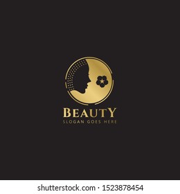 Gold Beauty Logo templates. Modern logo design with lotus and woman face. Can be used for health care, florist, photography, wedding, flower shop, cosmetics, spa and wellness, beauty