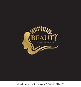 Gold Beauty Logo templates. Modern logo design with leaves, branch and woman face. Can be used for health care, florist, photography, wedding, flower shop, cosmetics, spa and wellness, beauty