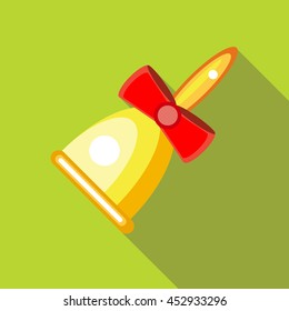 Gold bell with red bow icon in flat style on a green background