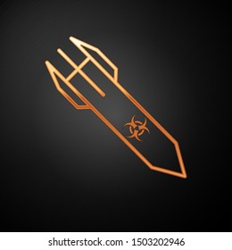 Gold Biohazard rocket icon isolated on black background. Rocket bomb flies down.  Vector Illustration