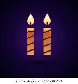 Gold Birthday cake candles icon isolated on dark blue background.  Vector Illustration