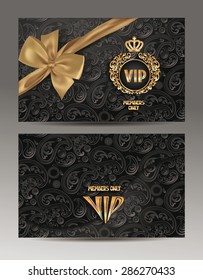 Gold and black envelopes with floral design and gold silk ribbon