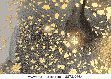 Gold and black stone marble texture with glowing lights. Alcohol ink technique abstract vector background. Modern paint with glitter. Template for banner, poster design. Fluid art painting