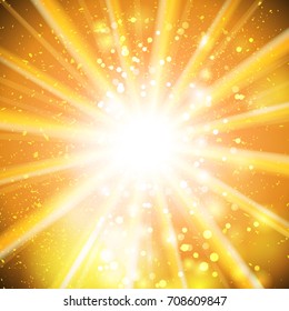 Gold bokeh abstract light background with rays