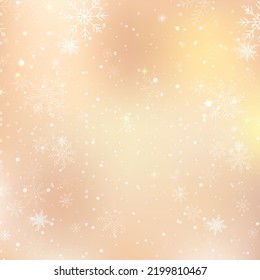 Gold bokeh background with snowflakes