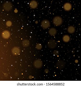 Gold bokeh, shiny glittering golden and silver stars. Glitter gold de-focused lights on black background. Christmas golden lights. Background of bright glow bokeh. Christmas Dust. Magic concept.