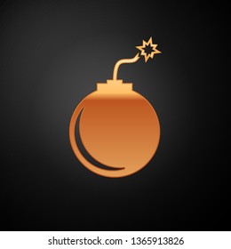 Gold Bomb ready to explode icon isolated on black background. Vector Illustration