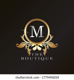 Plantilla de logotipo Gold Boutique M en el marco circular de diseño vectorial para la identidad de marca como Restaurante, Royalty, Boutique, Cafe, Hotel, Heraldic, Joyería, Moda y otras marcas