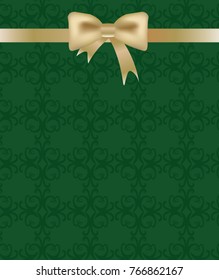 Gold bow on green background