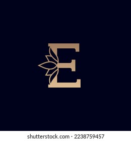 gold brand logo design with lotus flower letter E