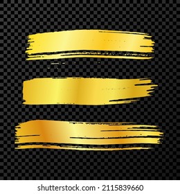 Gold brush stroke. Set of hand drawn ink spots isolated on dark transparent background. Vector illustration