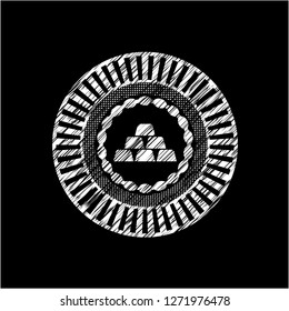 gold bullion icon inside chalk emblem written on a blackboard