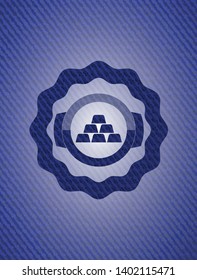 gold bullion icon inside emblem with denim texture