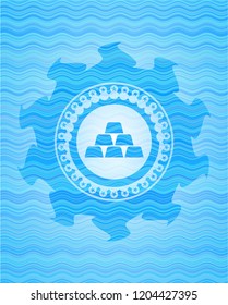 gold bullion icon inside water concept emblem.