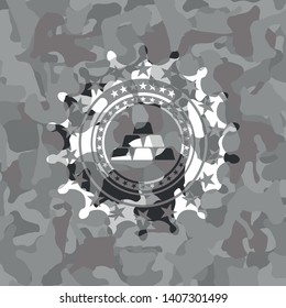gold bullion icon on grey camo texture