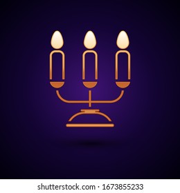 Gold Candelabrum with three candlesticks icon isolated on black background.  Vector Illustration