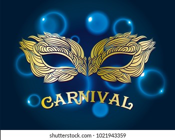 Gold carnival mask of feathers and patterns. A beautiful concept for the design of a poster, postcard, invitation card or banner. Vector illustration.