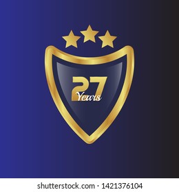 Gold celebration shield. 27 years anniversary
