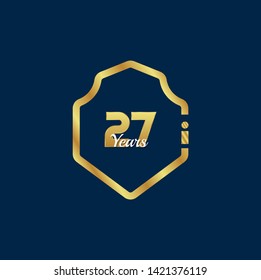 Gold celebration shield. 27 years anniversary