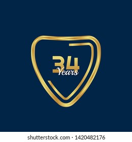 Gold celebration shield. 34 years anniversary.