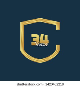 Gold celebration shield. 34 years anniversary.