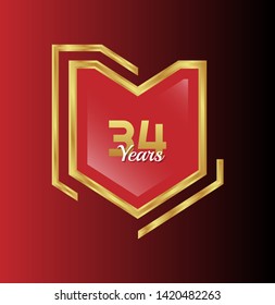 Gold celebration shield. 34 years anniversary.