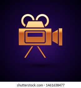 Gold Cinema camera icon isolated on dark blue background. Video camera. Movie sign. Film projector.  Vector Illustration