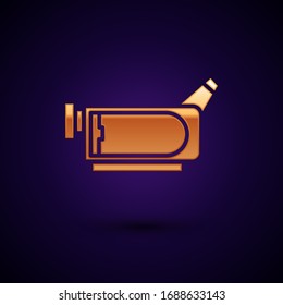 Gold Cinema camera icon isolated on black background. Video camera. Movie sign. Film projector.  Vector Illustration