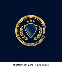 gold circle emblem with gold shield. glossy emblem. seal,label.gold logo