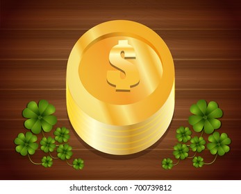 Gold coin and clover leaf on wooden desk