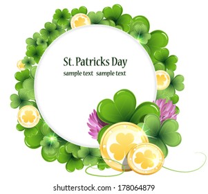 Gold coins on clover background with round place for text.   St. Patrick's Day background.