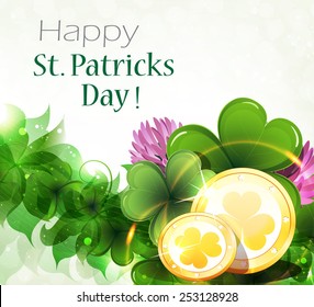 Gold coins on clover background with place for text.  St. Patrick's Day background.