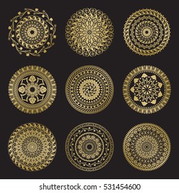 Gold color round abstract ethnic ornament mandalas. Based on old greek, arabic and turkish motifs. For textile, invitations, banners and other