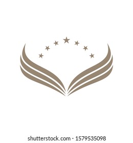 Gold colored wings on white background. Abstract wings icon with star shapes.