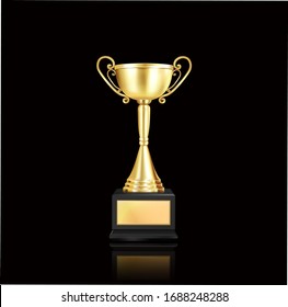 Gold colour trophy with shadow in dark background