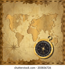 Gold compass with wind-rose on vintage map. Adventure stories background.