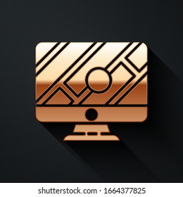 Gold Computer monitor and folded map with location marker icon isolated on black background. Long shadow style. Vector Illustration