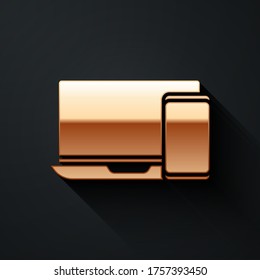 Gold Computer monitor and mobile phone icon isolated on black background. Earnings in the Internet, marketing. Long shadow style. Vector Illustration