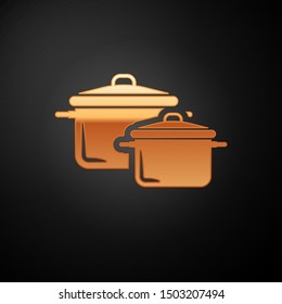 Gold Cooking pot icon isolated on black background. Boil or stew food symbol.  Vector Illustration